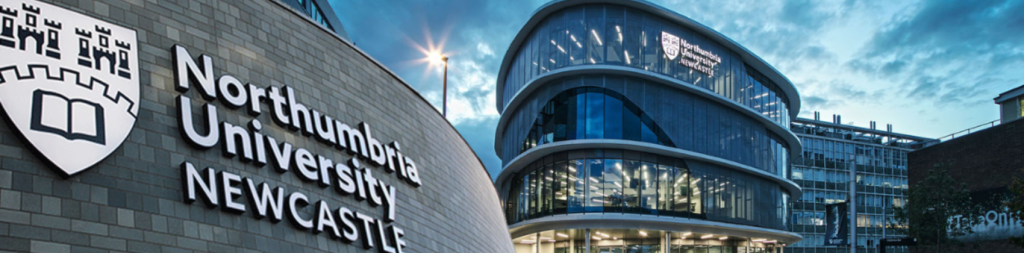 Northumbria University campus building in Newcastle with diverse international students walking near the entrance.